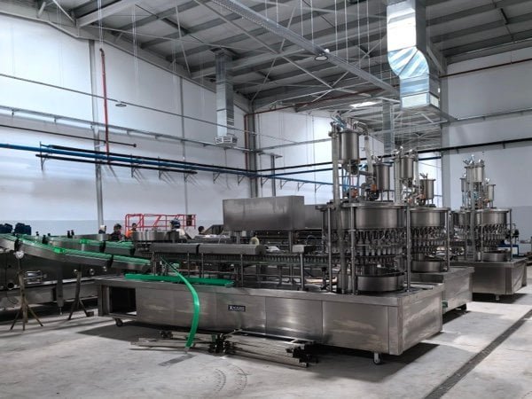 Ice lolly tube filling and sealing machine