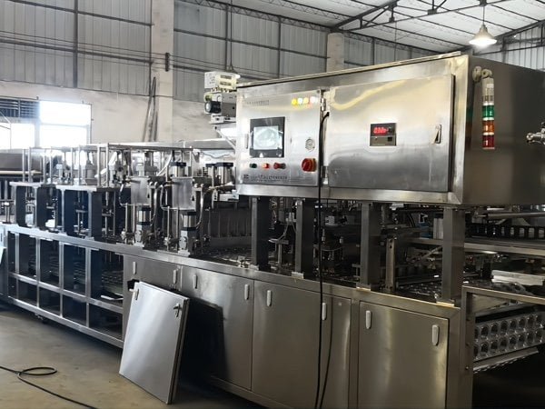 Dip stick chocolate filling and sealing machine
